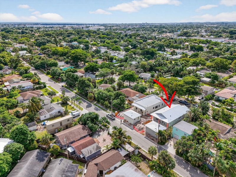 Front exterior of a new home in , West Palm Beach, FL, highlighting curb appeal (Image 2). Front exterior of a new home in , West Palm Beach, FL, highlighting curb appeal (Image 2).