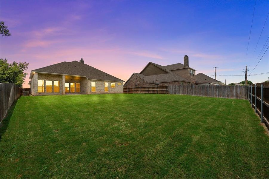 Spacious rear yard backing to open church-owned land with no homes directly behind. Spacious rear yard backing to open church-owned land with no homes directly behind.