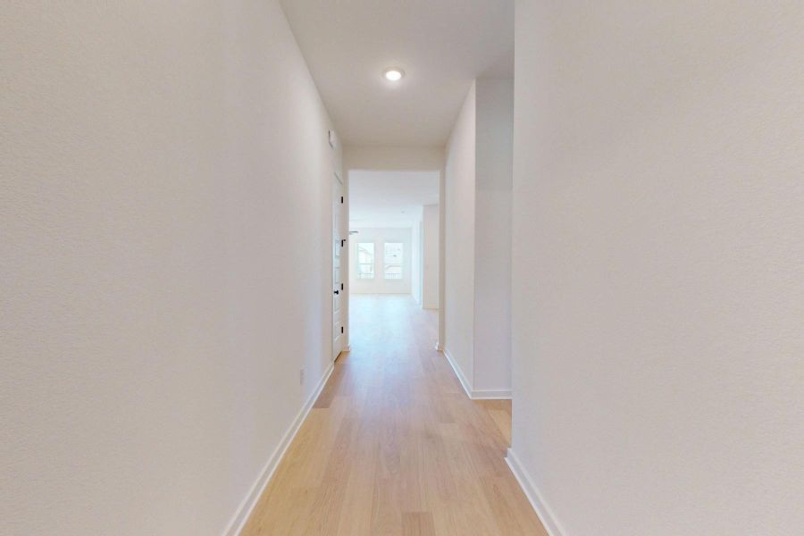 Spacious, unfurnished interior of a new home in Heritage, Dripping Springs (Image 24). Spacious, unfurnished interior of a new home in Heritage, Dripping Springs (Image 24).