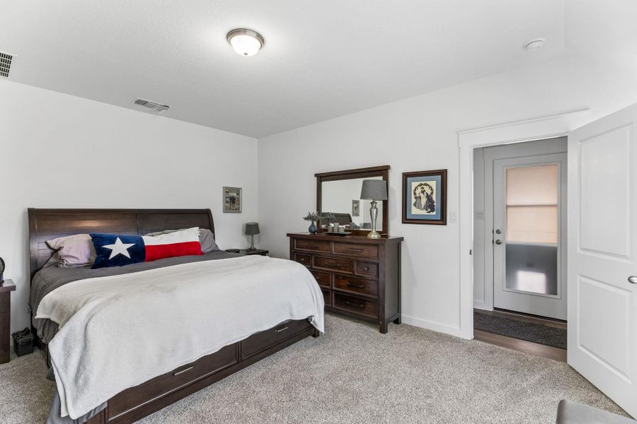 large spacious primary bedroom