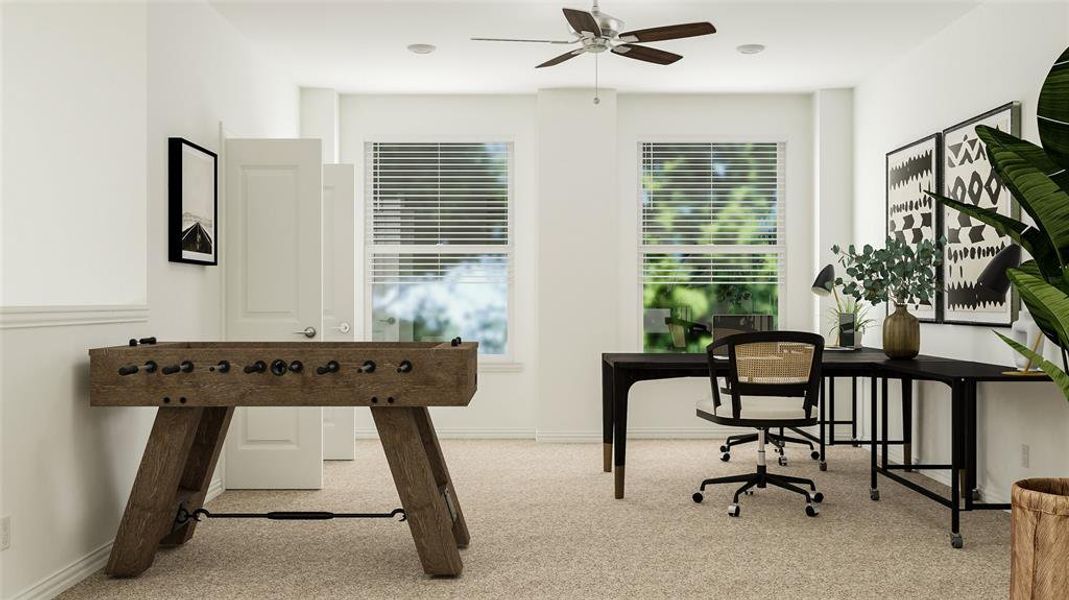 Office featuring light carpet, ceiling fan, and a healthy amount of sunlight