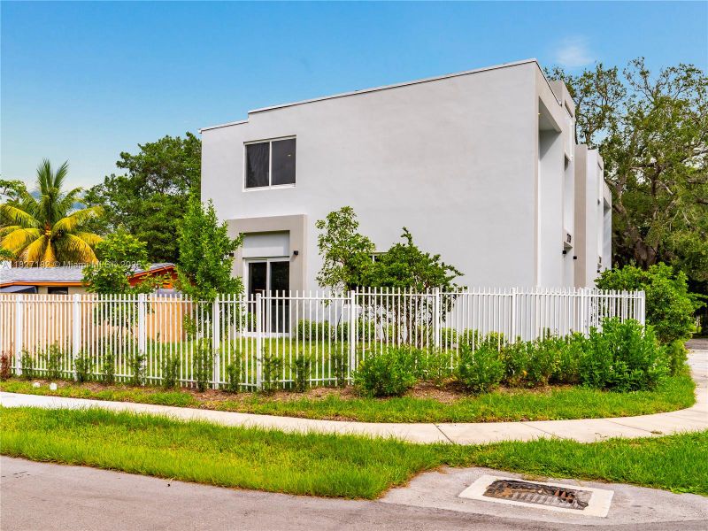 Front exterior of a new home in , Fort Lauderdale, FL, highlighting curb appeal (Image 19). Front exterior of a new home in , Fort Lauderdale, FL, highlighting curb appeal (Image 19).