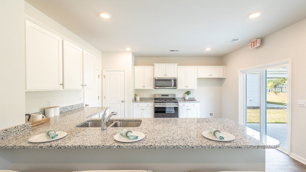 Furnished interior view inside a new home in Evergreen, Holly Hill (Image 11).