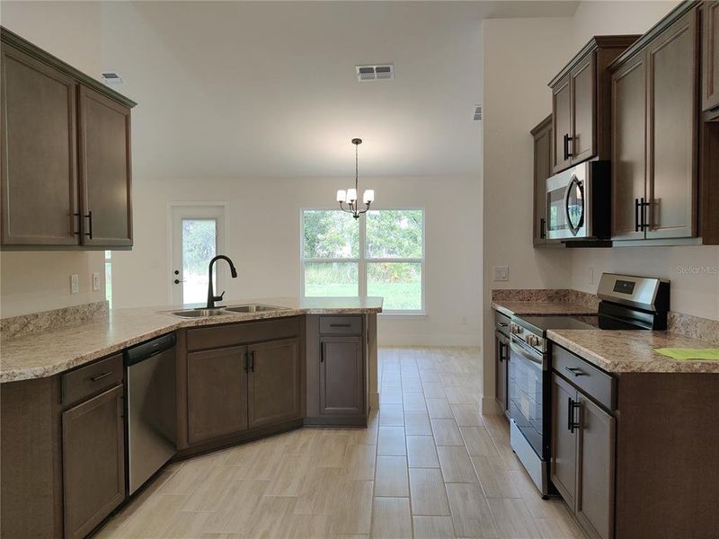 Furnished interior view inside a new home in Royal Highlands, Weeki Wachee (Image 4). Furnished interior view inside a new home in Royal Highlands, Weeki Wachee (Image 4).