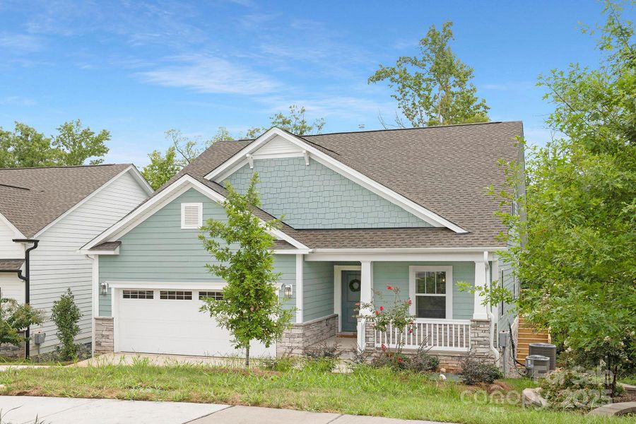 Front exterior of a new home in Edgewater - The Cottages, Lancaster, SC, highlighting curb appeal (Image 27).