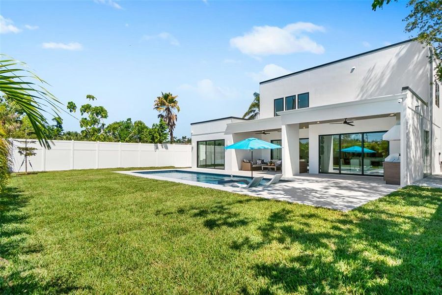 Front exterior of a new home in , Sarasota, FL, highlighting curb appeal (Image 33).