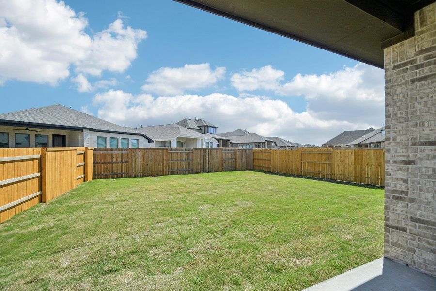 Exterior details and patio area of a home in 6 Creeks, Kyle (Image 3).