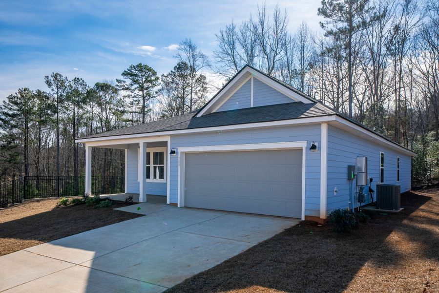 Front exterior of a new home in Carriage Estates, Lexington, SC, highlighting curb appeal (Image 24). Front exterior of a new home in Carriage Estates, Lexington, SC, highlighting curb appeal (Image 24).