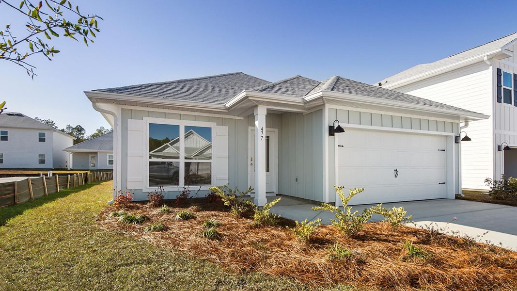 Front exterior of a new home in Bayside at Ward Creek, Panama City Beach, FL, highlighting curb appeal (Image 1). Front exterior of a new home in Bayside at Ward Creek, Panama City Beach, FL, highlighting curb appeal (Image 1).