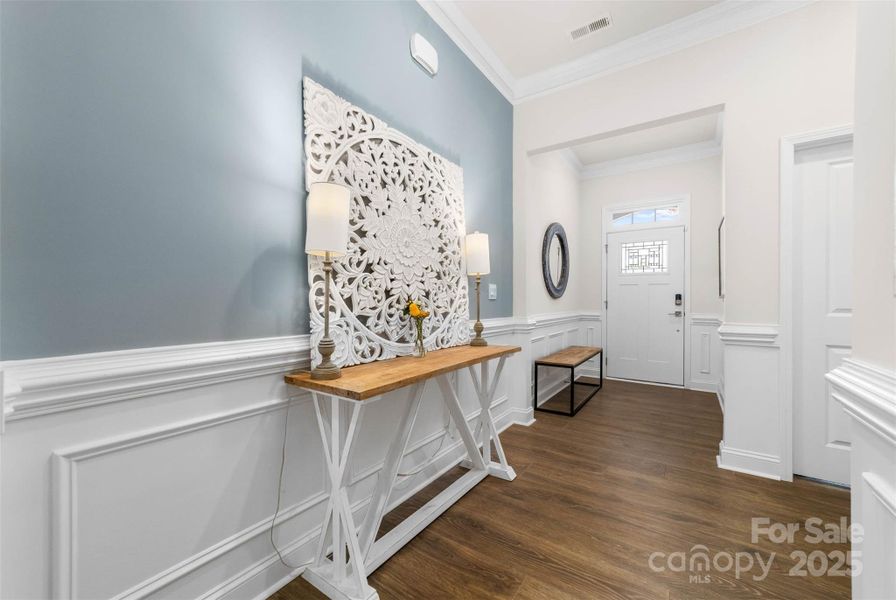 Welcoming foyer with 10 ft  ceilings throughout the main level