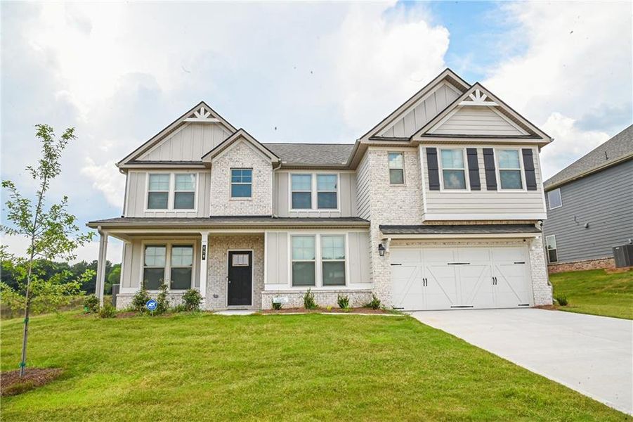 Front exterior of a new home in , Stockbridge, GA, highlighting curb appeal (Image 40).