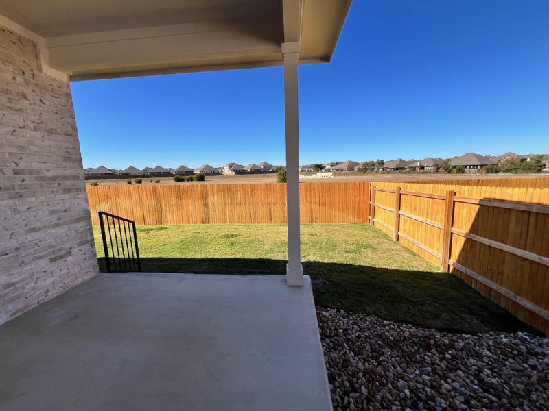 Exterior details and patio area of a home in Rosenbusch Ranch, Leander (Image 2). Exterior details and patio area of a home in Rosenbusch Ranch, Leander (Image 2).