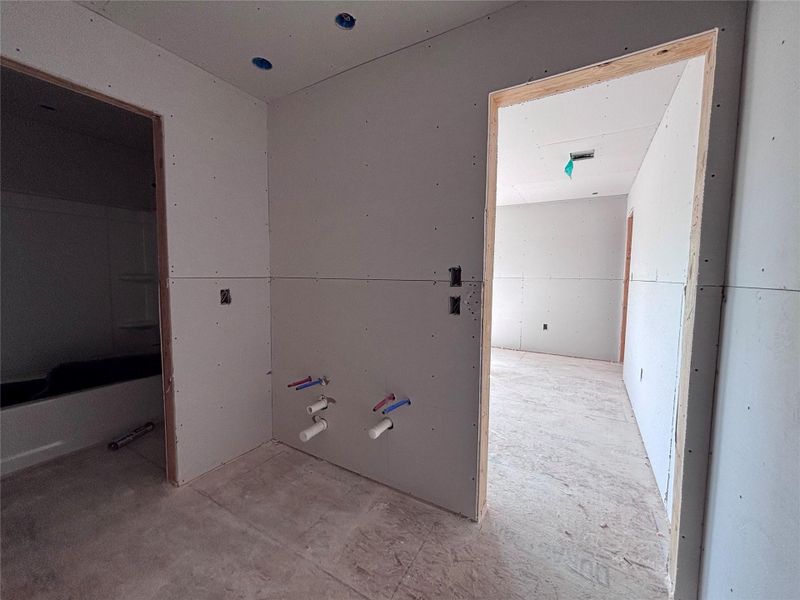 In-progress construction of a new home in The Colony, Bastrop, TX (Image 26).