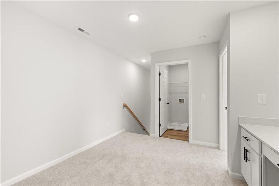 Spacious, unfurnished interior of a new home in Hemingway, Cumming (Image 13). Spacious, unfurnished interior of a new home in Hemingway, Cumming (Image 13).
