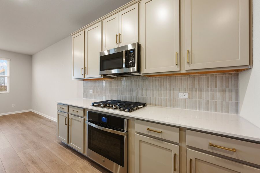 Representative furnished interior of a home built from the Lancaster by Ashton Woods in Berry Creek Highlands, Georgetown (Image 9).