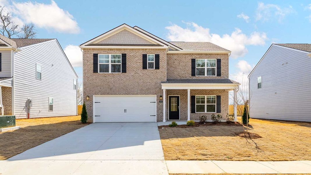 Front exterior of a new home in Fairview Hills, Cleveland, TN, highlighting curb appeal (Image 1). Front exterior of a new home in Fairview Hills, Cleveland, TN, highlighting curb appeal (Image 1).