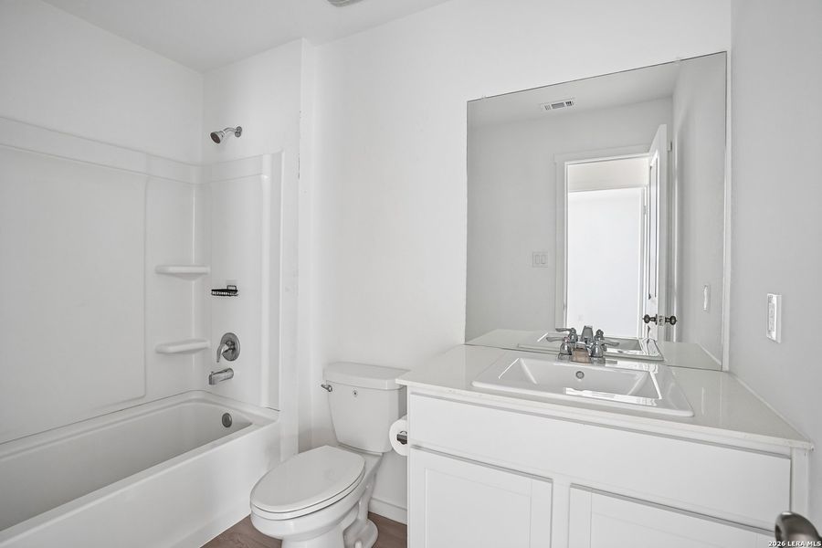 Furnished interior view inside a new home in Steelwood Trails, New Braunfels (Image 7).