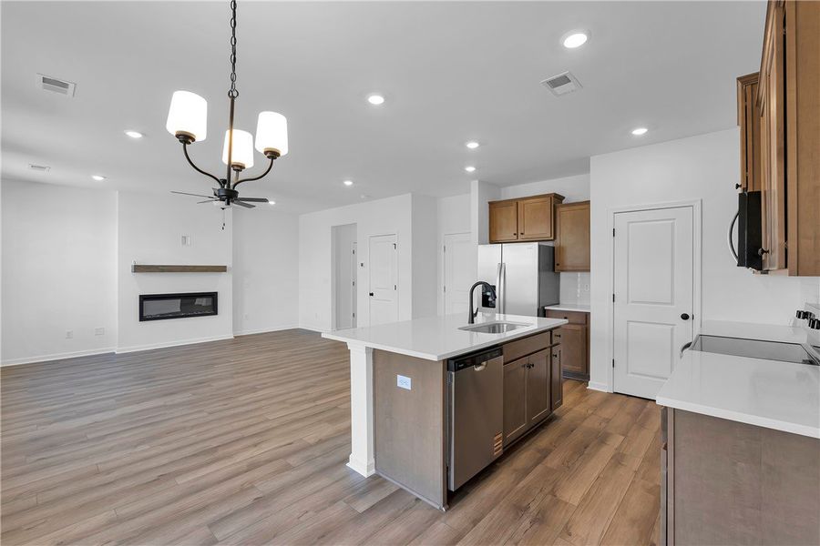 This inviting space combines kitchen and living ar