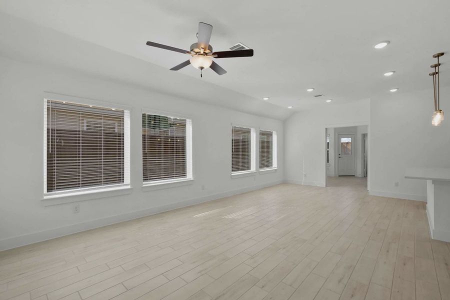 Representative unfurnished interior of a home built from the Chalet by Chesmar Homes in Meridiana Townhomes, Iowa Colony (Image 19).