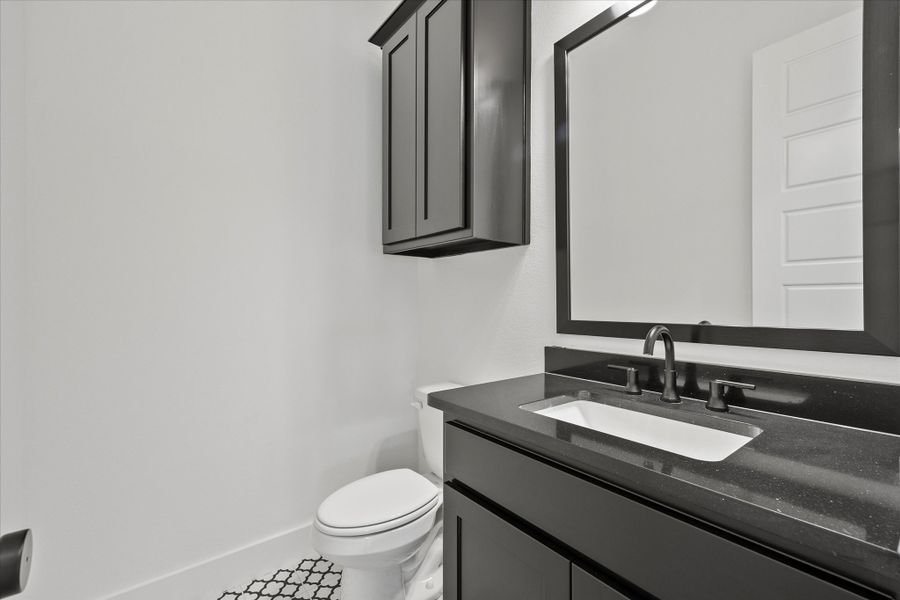 Representative furnished interior of a home built from the Davenport by Windsor Homes in Winding Creek, Rockwall (Image 13).
