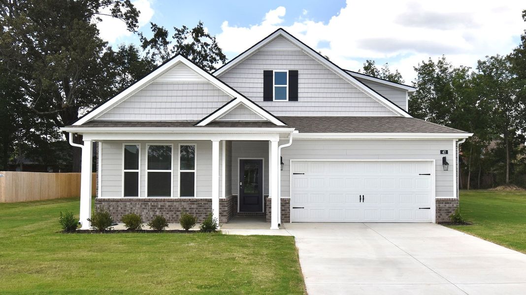 Front exterior of a new home in Shiloh Springs, Jackson, TN, highlighting curb appeal (Image 2).