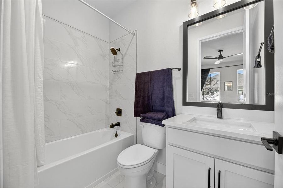 Furnished interior view inside a new home in The Peninsula at Rhodine Lake, Riverview (Image 31).