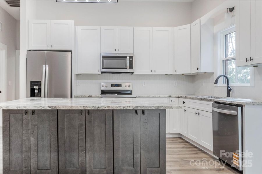 Furnished interior view inside a new home in , Hickory (Image 9).