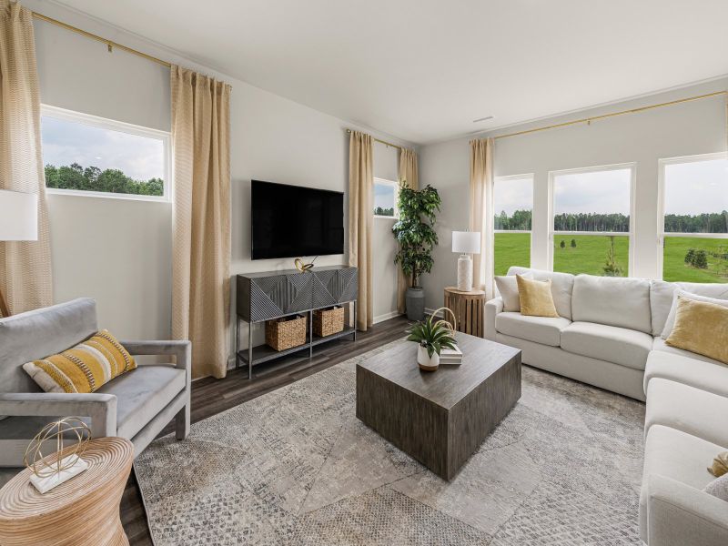 Living area in the Taylorsville floorplan at a Meritage Homes community in Wendell, NC.