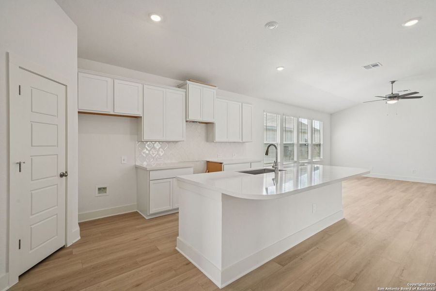 Furnished interior view inside a new home in Estancia Ranch - Premier Series, San Antonio (Image 6).