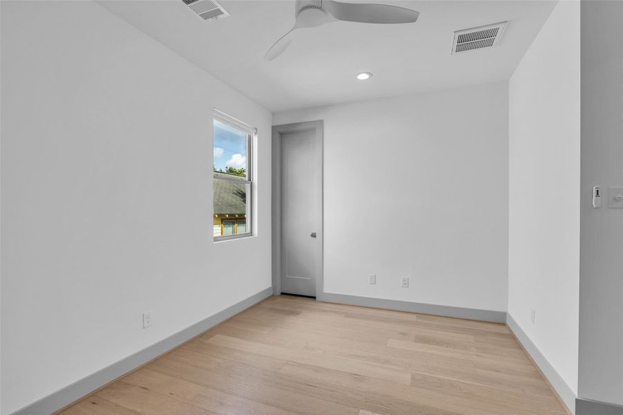 Another secondary bedroom on the second floor offers the same comfortable features as the previous bedroom, including a window overlooking the neighborhood and a flexible layout that can be personalized to fit your needs.