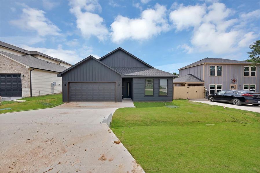 Front exterior of a new home in , Granbury, TX, highlighting curb appeal (Image 17).