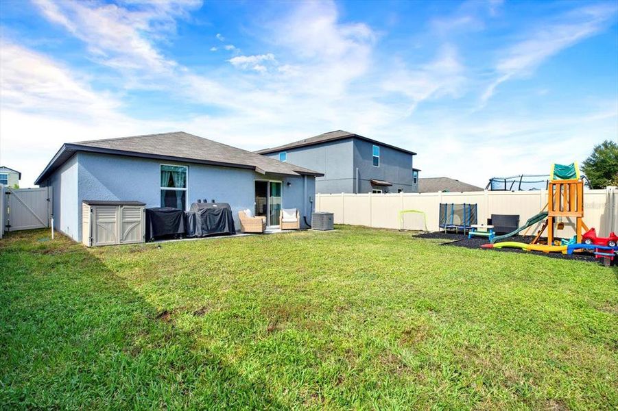 Exterior details and patio area of a home in , Wimauma (Image 22).