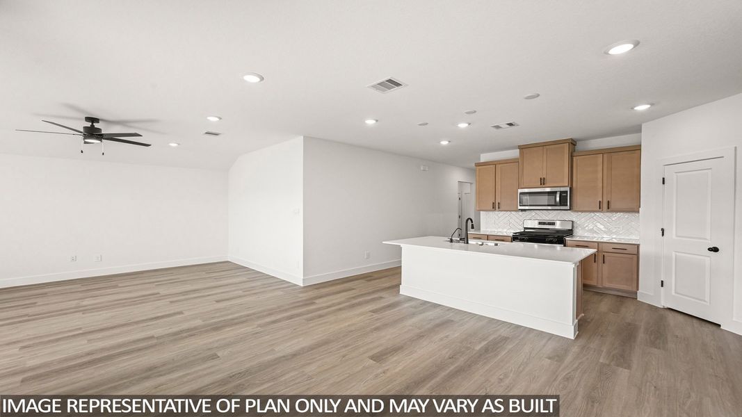 Furnished interior view inside a new home in Sunterra Lakes, Brookshire (Image 7). Furnished interior view inside a new home in Sunterra Lakes, Brookshire (Image 7).