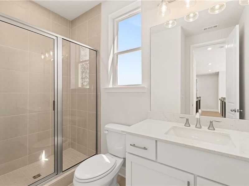 Furnished interior view inside a new home in Melody Lakeside Estates, Buford (Image 13).