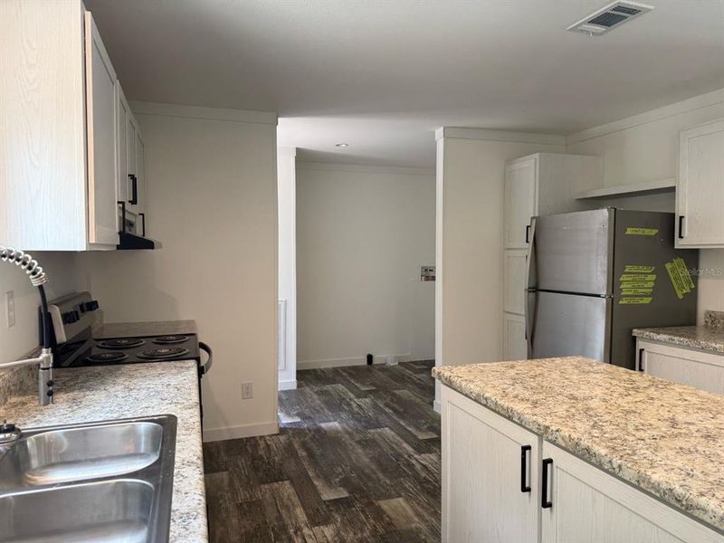 Furnished interior view inside a new home in , Crystal River (Image 11).