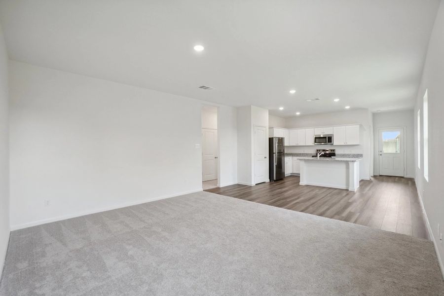 Representative unfurnished interior of a home built from the Enterprise by Starlight Homes in Eagles Landing, Elgin (Image 14).