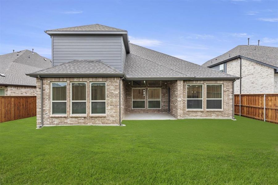 Front exterior of a new home in Las Lomas, Forney, TX, highlighting curb appeal (Image 18).