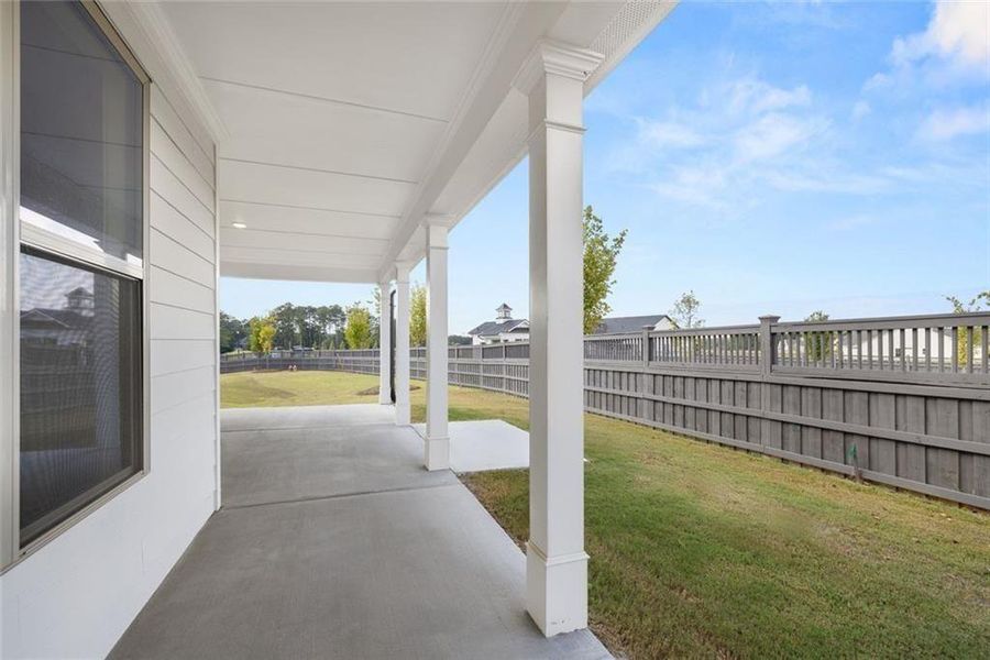 Exterior details and patio area of a home in Soleil Summit Chase, Snellville (Image 29).