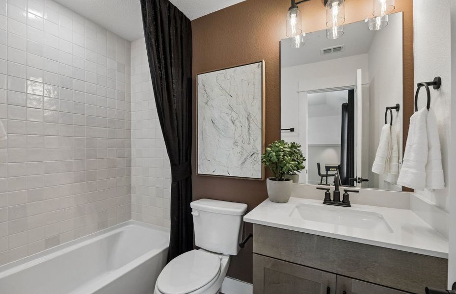Representative furnished interior of a home built from the Rainier by Pulte Homes in Overland Grove, Forney (Image 11).
