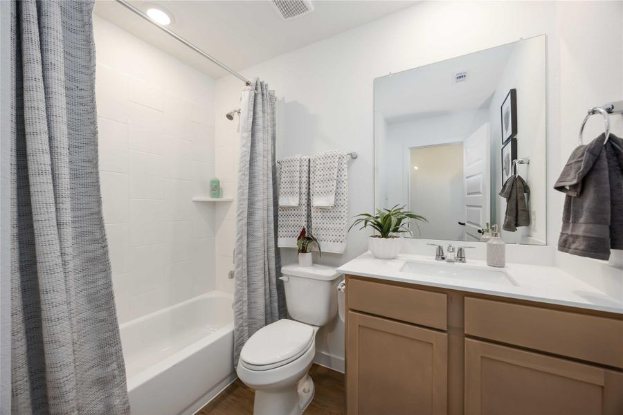 Furnished interior view inside a new home in Grand West, Houston (Image 24).