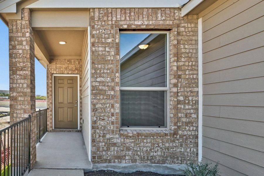 Exterior details and patio area of a home in Creekside at Estancia, Austin (Image 3).