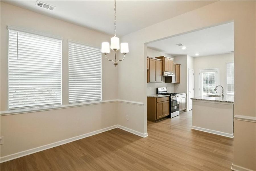 Furnished interior view inside a new home in Castleberry Pointe, Dawsonville (Image 9).