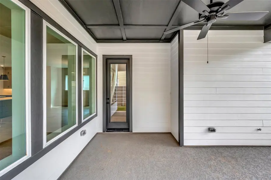 Exterior details and patio area of a home in Two Step Farm - Landmark Row Collection, Montgomery (Image 27).