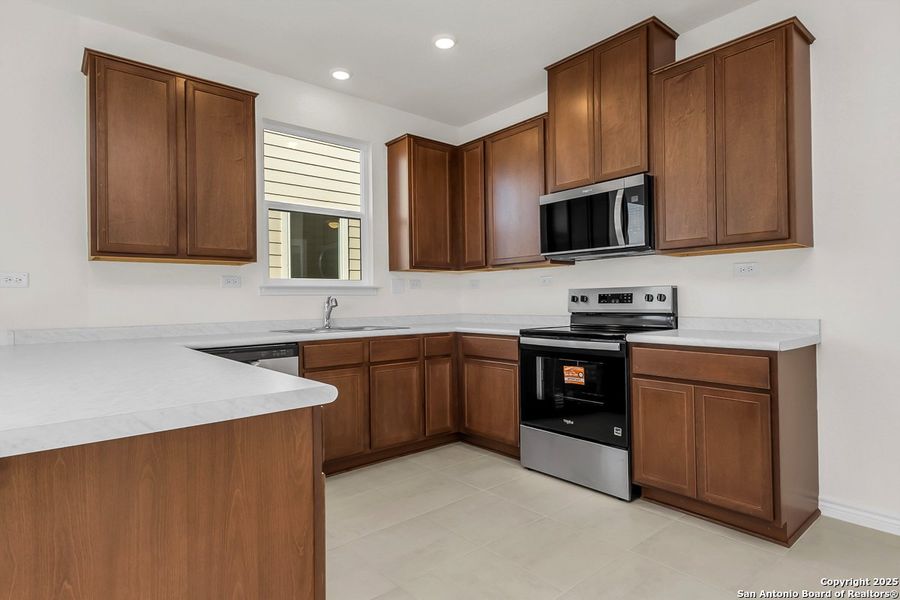Furnished interior view inside a new home in Southton Cove, Elmendorf (Image 6).