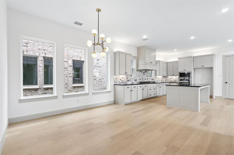 Whether it's lively dinner parties or cozy family meals, this light filled dining room fits all occasions! Whether it's lively dinner parties or cozy family meals, this light filled dining room fits all occasions!