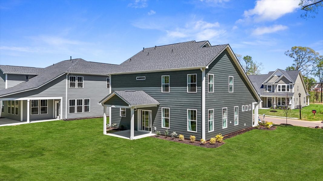 Exterior details and patio area of a home in Creeks at Midway, Anderson (Image 22).