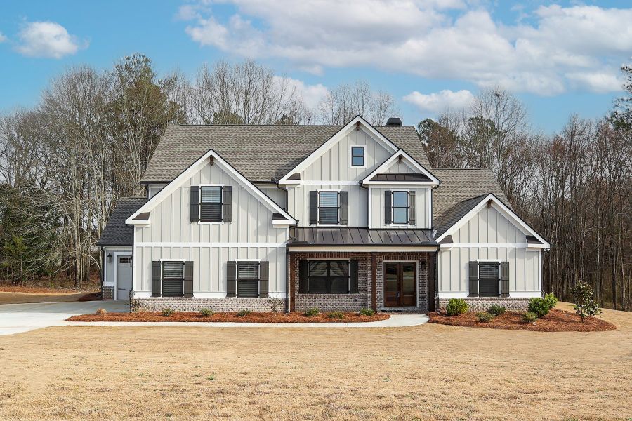 Front exterior of a new home in Stonegate, Monroe, GA, highlighting curb appeal (Image 1). Front exterior of a new home in Stonegate, Monroe, GA, highlighting curb appeal (Image 1).