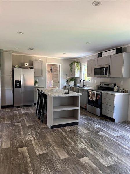 Furnished interior view inside a new home in , Pelican Bay (Image 5).