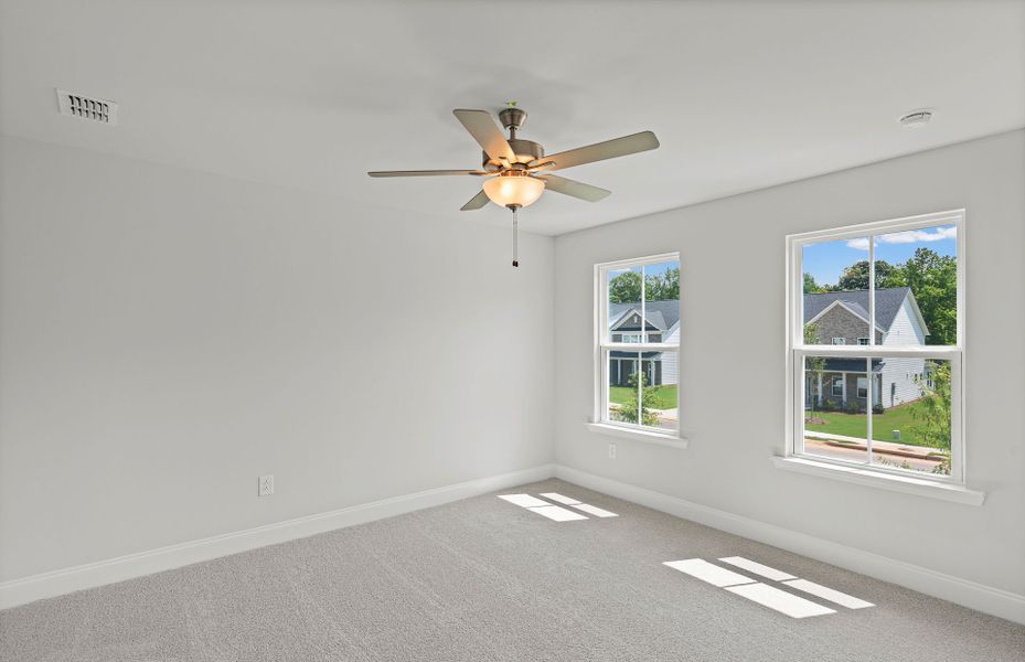 Spacious, unfurnished interior of a new home in Berkeley Mill, Cumming (Image 40).