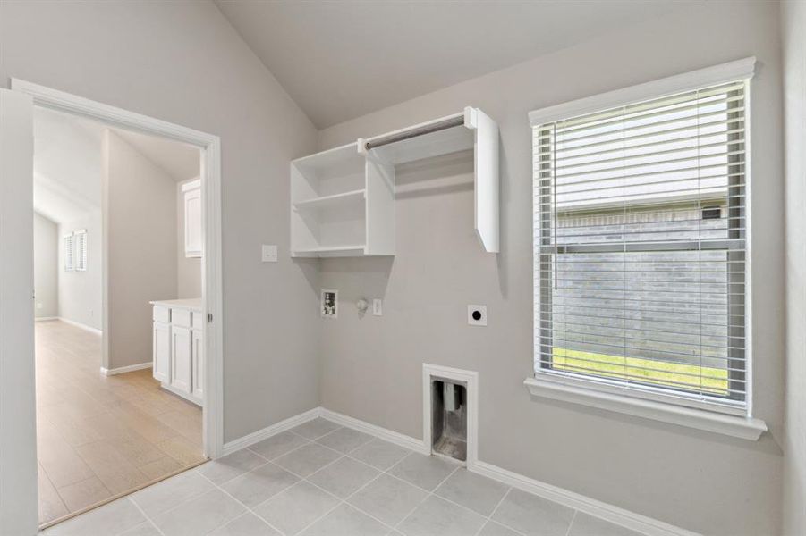 Utility Room in the Diamond home plan by Trophy Signature Homes – REPRESENTATIVE PHOTO Utility Room in the Diamond home plan by Trophy Signature Homes – REPRESENTATIVE PHOTO
